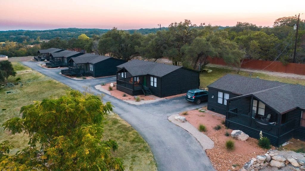 Featured image for Texas Wedding Village: Your 14-Cabin Hill Country Compound