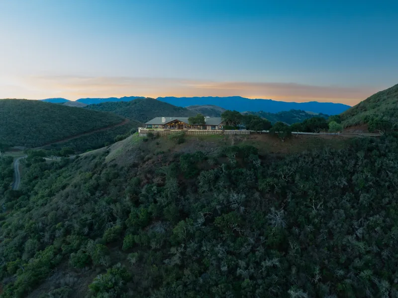 Sweeping 180-degree panoramic view from Skyview Retreat showing Santa Ynez Valley and mountain ranges