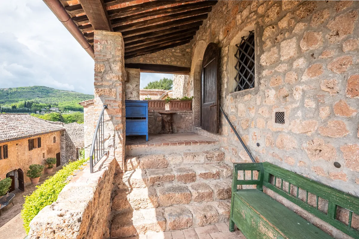 Medieval tower and Tuscan landscape