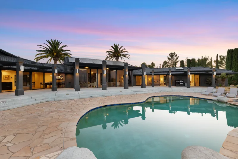 Stunning luxury estate with manicured gardens and guest accommodations perfect for wedding celebrations