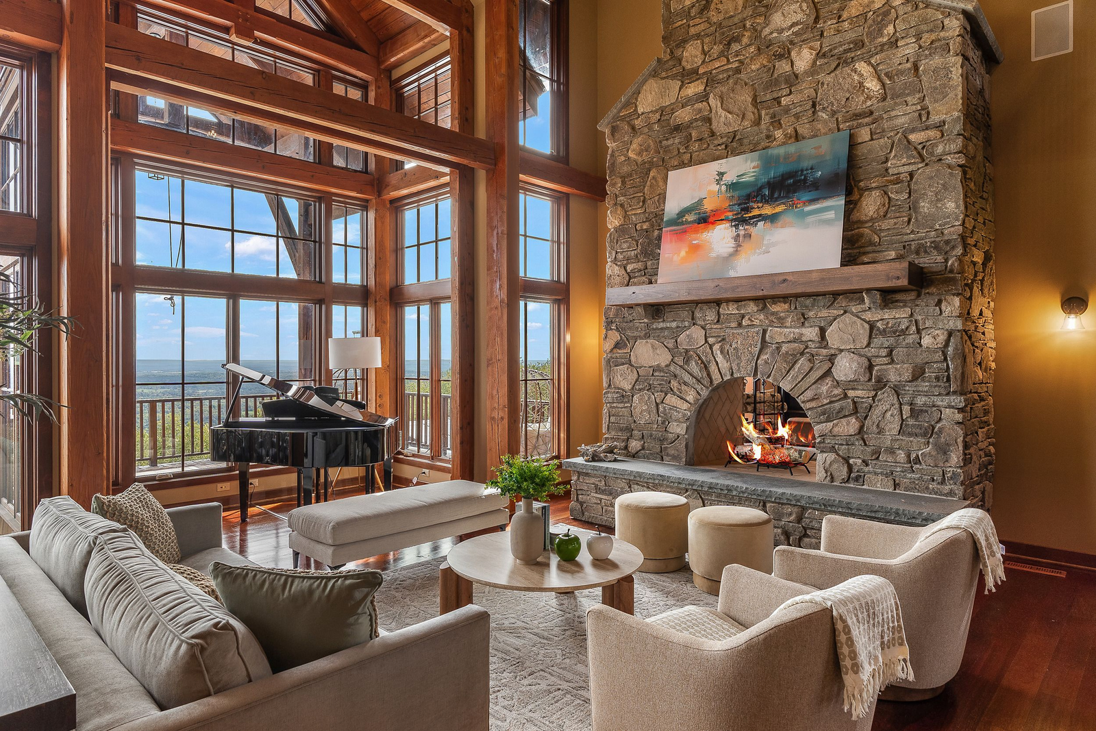 Great room interior with vaulted ceilings and mountain-view windows