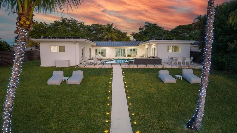 Event space at Modern  Miami Beach Lakeside Retreat with Sun-Soaked Yard