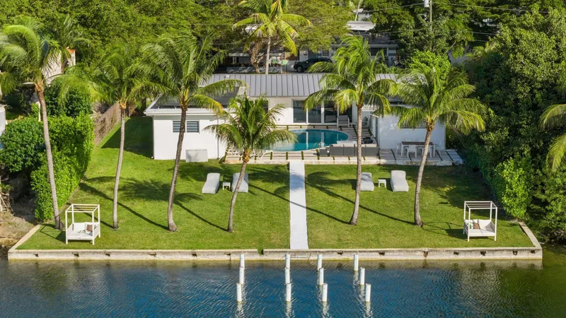 Event space at Modern  Miami Beach Lakeside Retreat with Sun-Soaked Yard