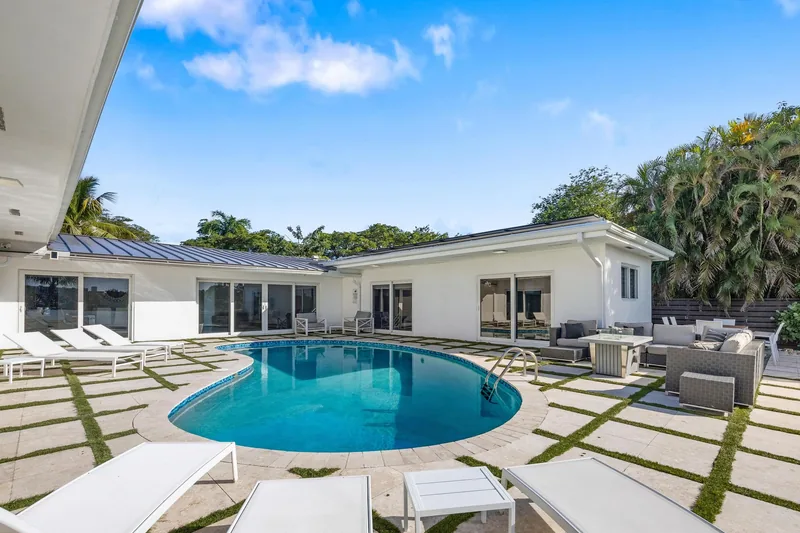 Event space at Modern  Miami Beach Lakeside Retreat with Sun-Soaked Yard