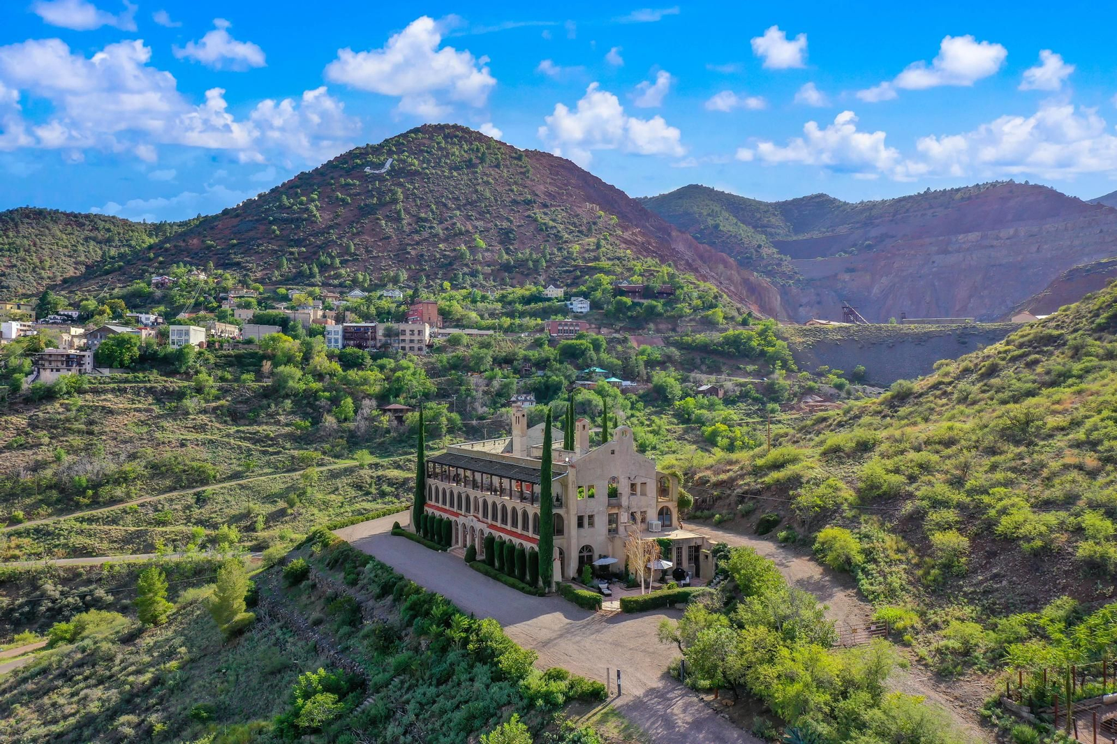 Historic Jerome estate exterior with desert mountain views