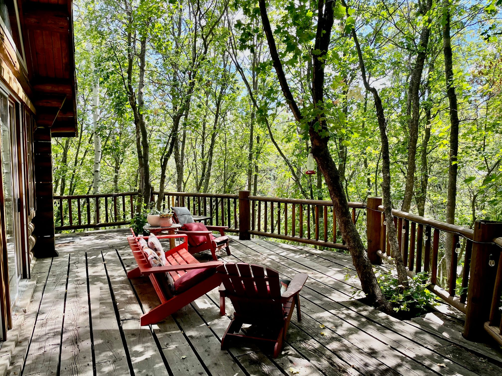 Evening gathering space with firepit and surrounding mountains