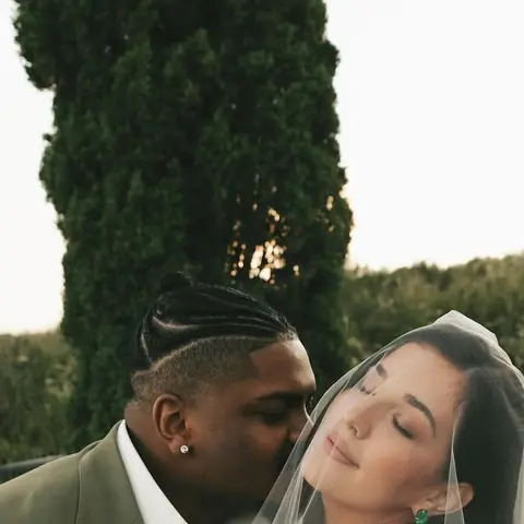 A photographer on another couple, married at a private estate in California
